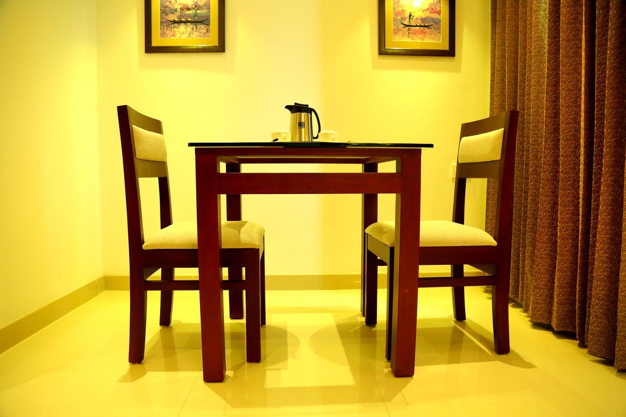 Hotel De Grand Kozhikode Esterno foto